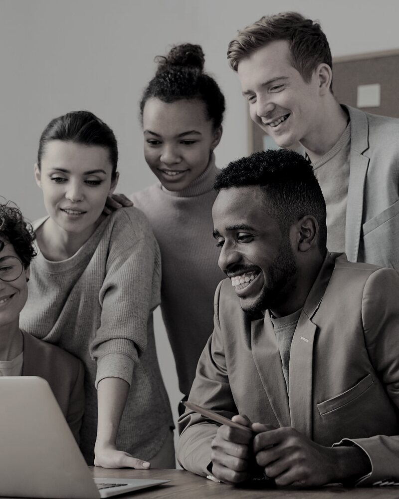 Forge Endeavours team members reviewing a client brand campaign together